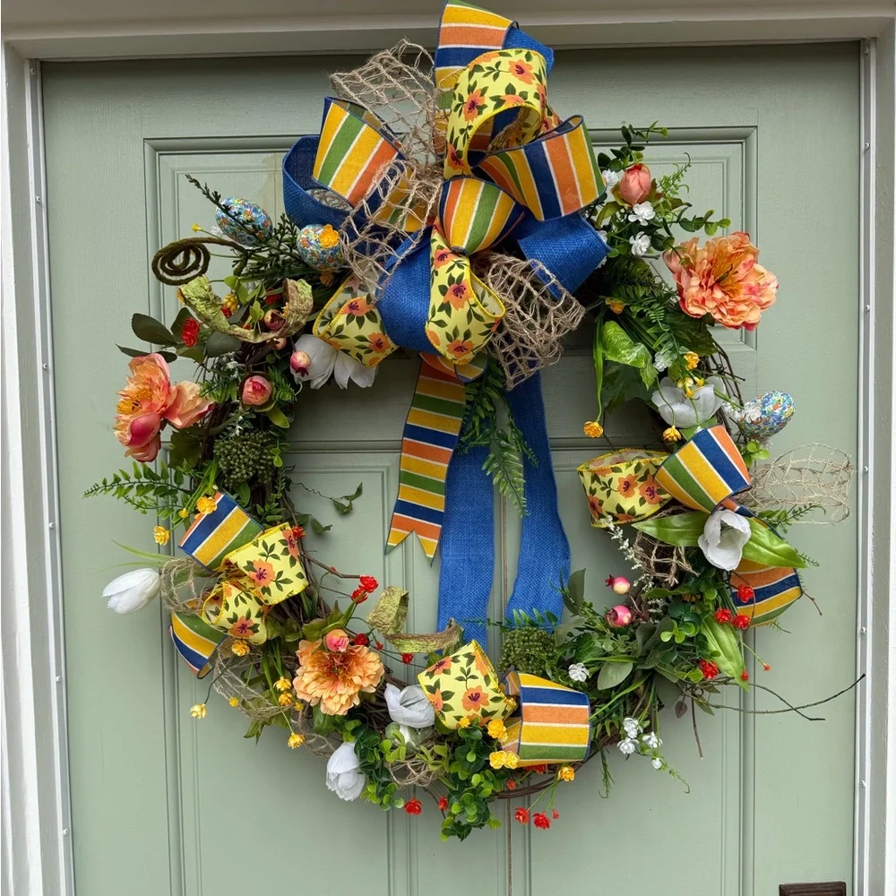 Festive Floral Wreath with Blue and Yellow Accents